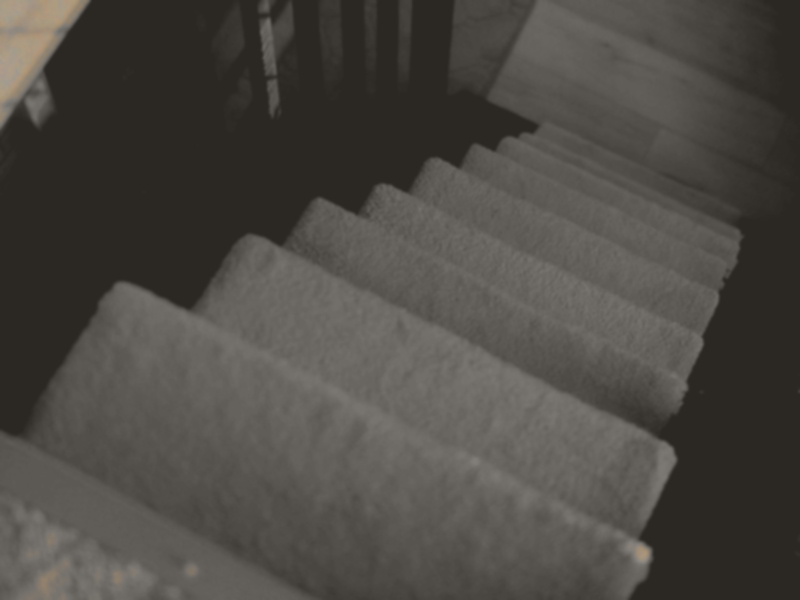 Staircase carpet before professional cleaning